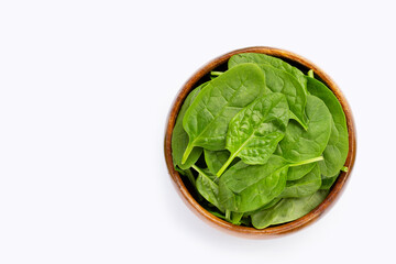 Spinach leaves on white background.