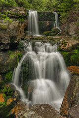Fototapeta na wymiar Waterfall of Jedlova creek in Jizerske mountains in spring morning