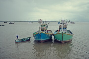 Naklejka na ściany i meble fishing boats in the harbor