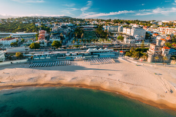 Estoril, Portugal - June 9, 2022: Aerial view of Tamariz Beach with Casino Estoril in the end of...