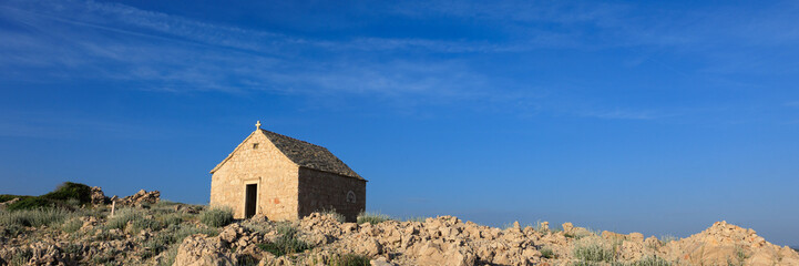 Fototapeta na wymiar panorama with church on blue sky