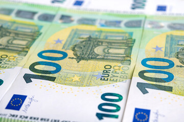 Detail of the one hundred euro banknote. European currency close-up photograph.