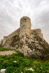 Krak des Chevaliers medieval crusader castle in Syria, a world heritage site. - obrazy, fototapety, plakaty