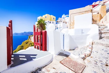 Poster Santorini, Greece - White village of Oia withe cobblestone narrow streets © ecstk22