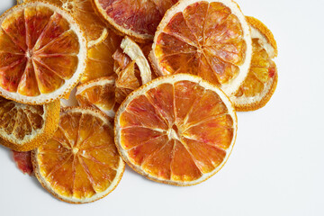 Natural Dried Oranges Slices Snack. Dried Oranges for baking. Dried grapefruit, slices and dried candie citrus fruit.  Isolated white background.