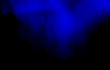 Blue powder explosion on black background. Colored cloud. Colorful dust explode.