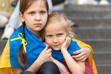 Evacuation Kids from War Ukraine. Ukrainian Migrant Kids. Children Refugee from Ukraine. Two...
