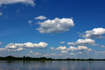 Foto op Canvas clouds over the river © Raibkashi