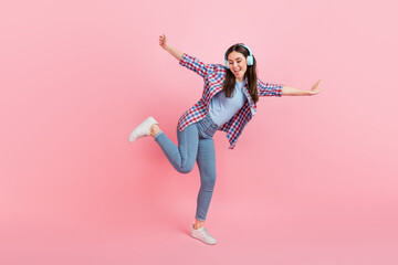 Full size photo of charming energetic cheerful girl dancing in nightclub isolated on pink color background