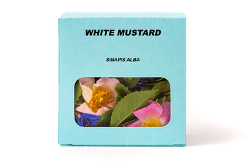Obraz premium White Mustard Medicinal herbs in a cardboard box. Herbal tea in a gift box