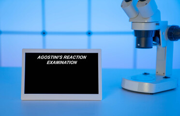 Medical tests and diagnostic procedures concept. Text on display in lab Agostini's Reaction...