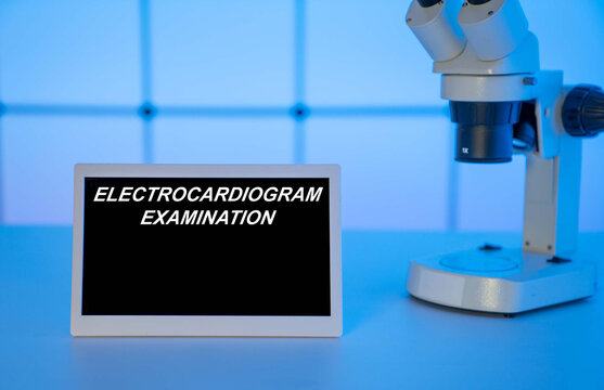 Medical tests and diagnostic procedures concept. Text on display in lab Electrocardiogram Examination