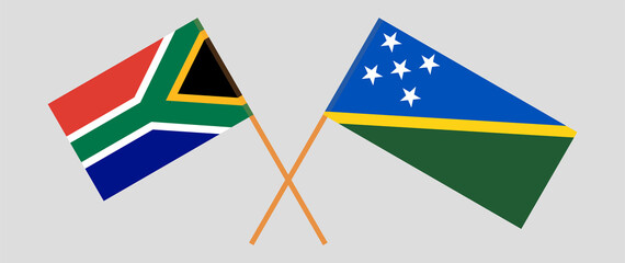 Crossed flags of South Africa and Solomon Islands. Official colors. Correct proportion