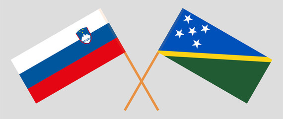 Crossed flags of Slovenia and Solomon Islands. Official colors. Correct proportion