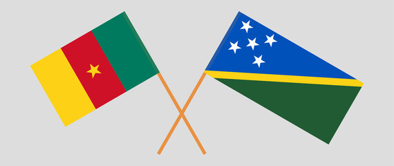 Crossed flags of Cameroon and Solomon Islands. Official colors. Correct proportion