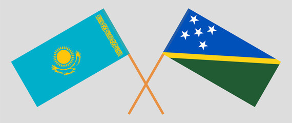 Crossed flags of Kazakhstan and Solomon Islands. Official colors. Correct proportion