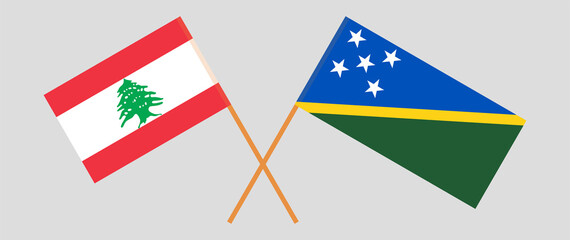 Crossed flags of the Lebanon and Solomon Islands. Official colors. Correct proportion