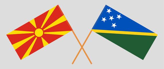 Crossed flags of North Macedonia and Solomon Islands. Official colors. Correct proportion