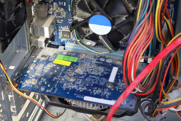 The desktop computer is covered in dust. Dust on the computer board. The CPU cooler and fan are...