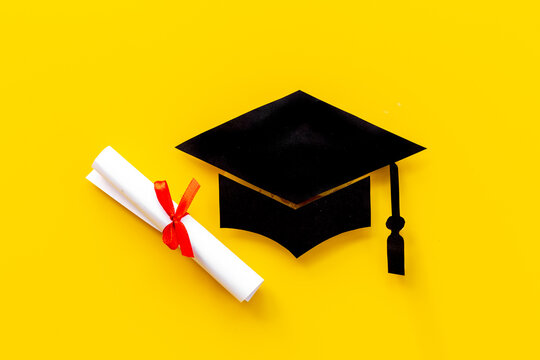Education concept. Graduation hat or academic cap paper cut with diploma