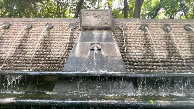rainwater flowing in the nezahualcoyotl aqueduct in mexico city towards mexico city in very slow motion