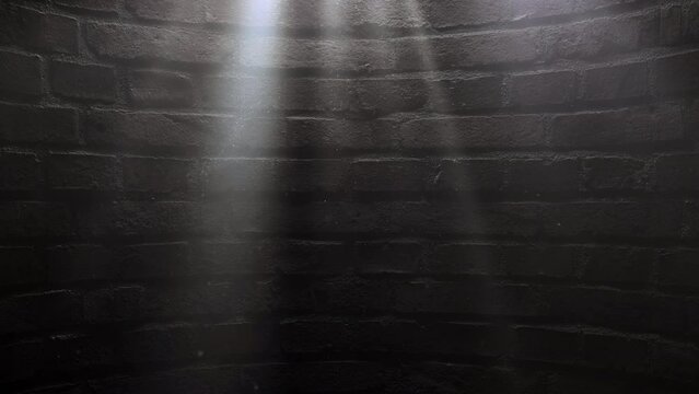 Sunbeams on cellar brick wall, dust particles flying in the air. Rays of light in a dark room. Seamless loop animation