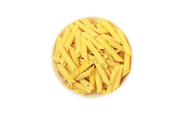 Penne italian pasta in white ceramical bowl on pink background with copy space, top view.