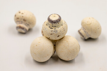 Fototapeta na wymiar Mushroom chocolate isolated on white background. Close-up. Mushroom-shaped coated chocolate dragee