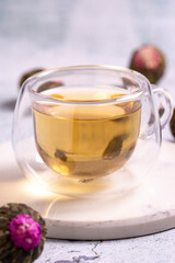Jasmine tea balls isolated on white background. Flowering tea or blooming tea. close up