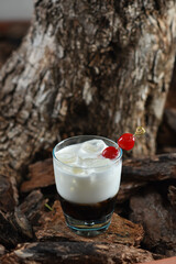 Cocktail based on vodka and coffee with cream White Russian
