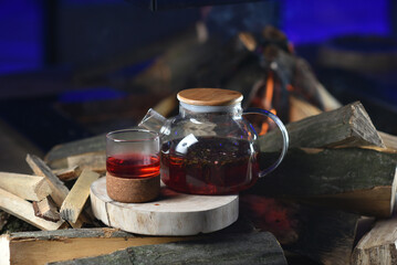 Pomegranate tea in a glass teapot
