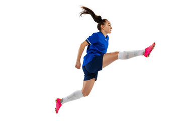 Dynamic portrait of female professional soccer, football player practicing isolated on white studio background. Sport, action, motion, fitness concept