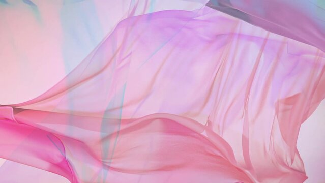 Pastel color transparent silk fabric flowing by wind, super slow motion