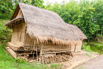 Fototapeta na wymiar Bamboo house in the Borhia village along the Mekong river - Luang Prabang - Laos, Asia