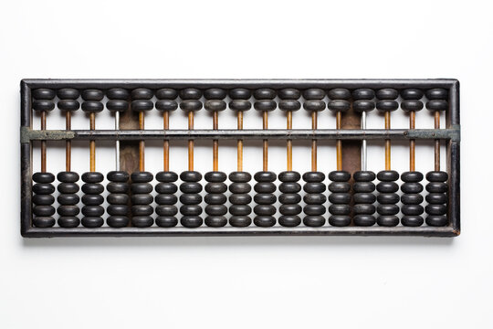Vintage wooden abacus isolated on white
