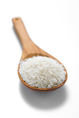 White jasmine rice in the wood spoon