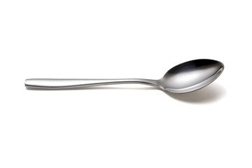 The metal shiny spoon isolated on white