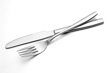 The metal shiny fork and knife on a white background.