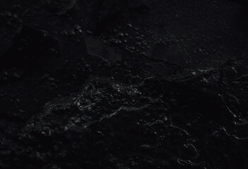 Black texture. Dark marble. Silver Wall. Rock background. Rock texture. Stone background. Rock pile. Paint spots. Rock surface with cracks. Grunge Rough structure. Abstract texture.