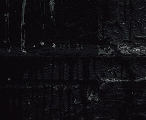 Grunge Rough structure. Black texture. Stone background. Dark marble. Rock texture. Rock surface with cracks. Rock pile. Paint spots wall. Abstract texture.