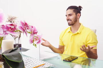 man working in front of his laptop