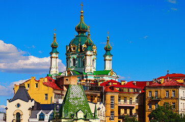 Picturesque spring cityscape of Kyiv. Saint Andrew's Church and ancient buildings of Andrew's...