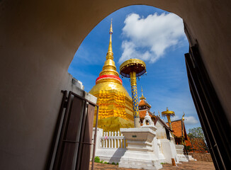 The Golden pagoda at Wat Phra That Lampang Lung, Thailand.