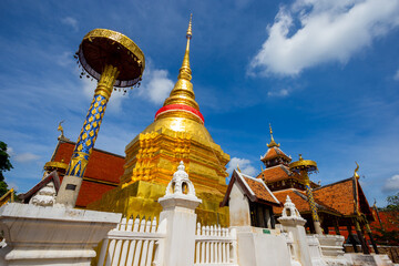 The Golden pagoda at  Wat Pong Sanuk Nuea Temple, Lampang, Thailand.