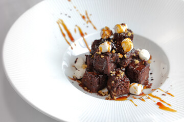 Chocolate Brownies Cube Cake on white plate