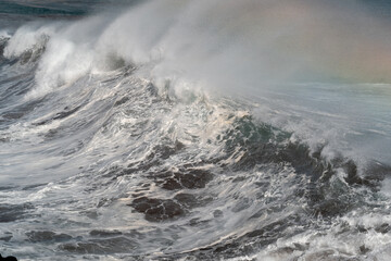 close up. strong wave in a stormy day