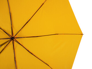Underside of Yellow umbrella with eight ribs isolated on white background. Bottom view 