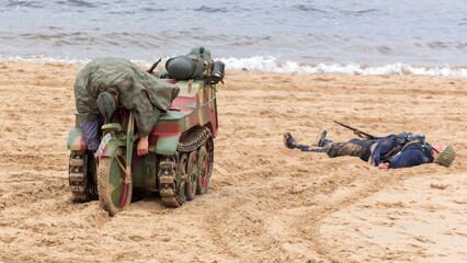 Russia Samara November 2018: German tracked motorcycle Kettenkrad 1944 with dead soldiers.