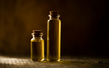 bottle of oil with flowers. Oil bottle. Glass. Nature. Beauty. Spa concept. Essential. 