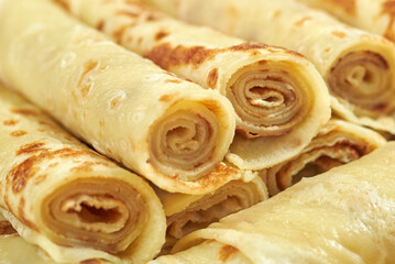 Group of fresh rolled fried pancakes, macro.